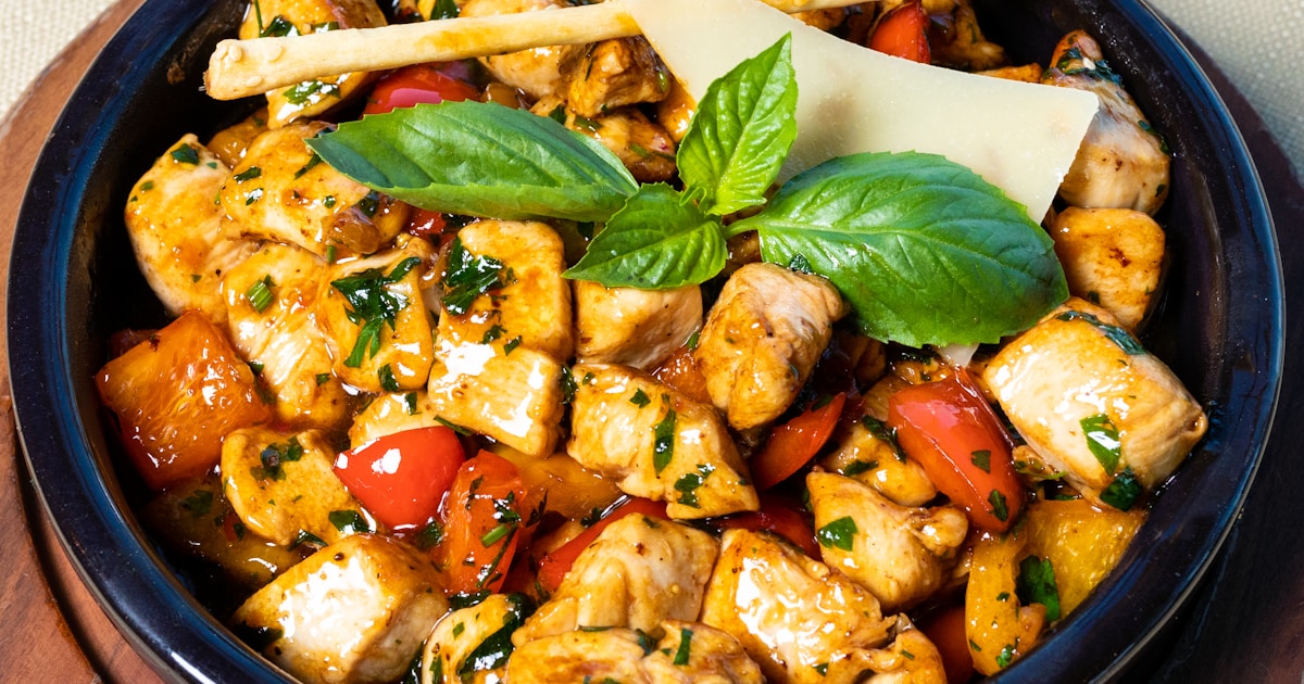Restaurant-quality chicken dish with tomatoes and fresh herbs